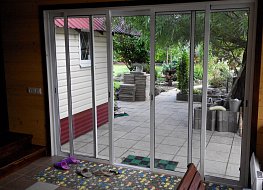 Входные раздвижные алюминиевые двери. подходит для Беседок, веранд, выход на балкон. Оптимальный вариант по остеклению. Любой цвет.